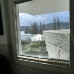 Blick aus dem Fenster auf den Rhein und die umliegende Landschaft